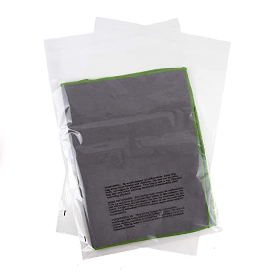 clear custom zipper bag with garment on a white background