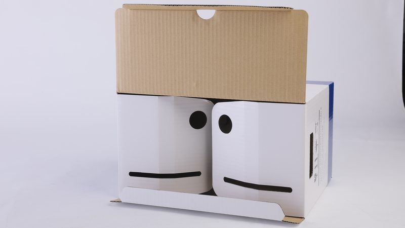 Open corrugated cardboard box showing internal product fit and protective structure
