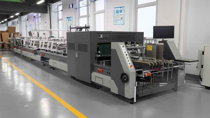 Automated paper packaging production line in a packaging factory
