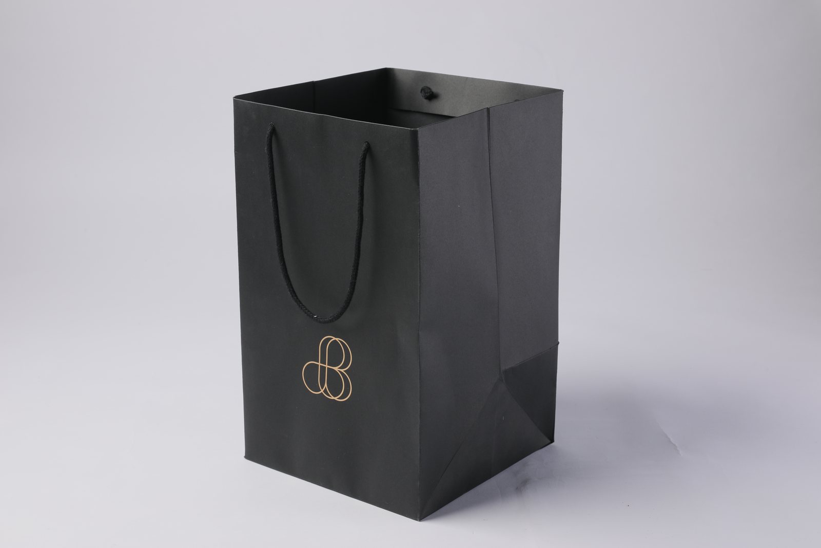 black branded paper bag for retail checkout