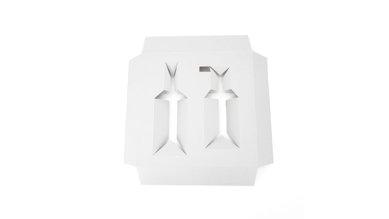 Paperboard insert with two shaped product openings